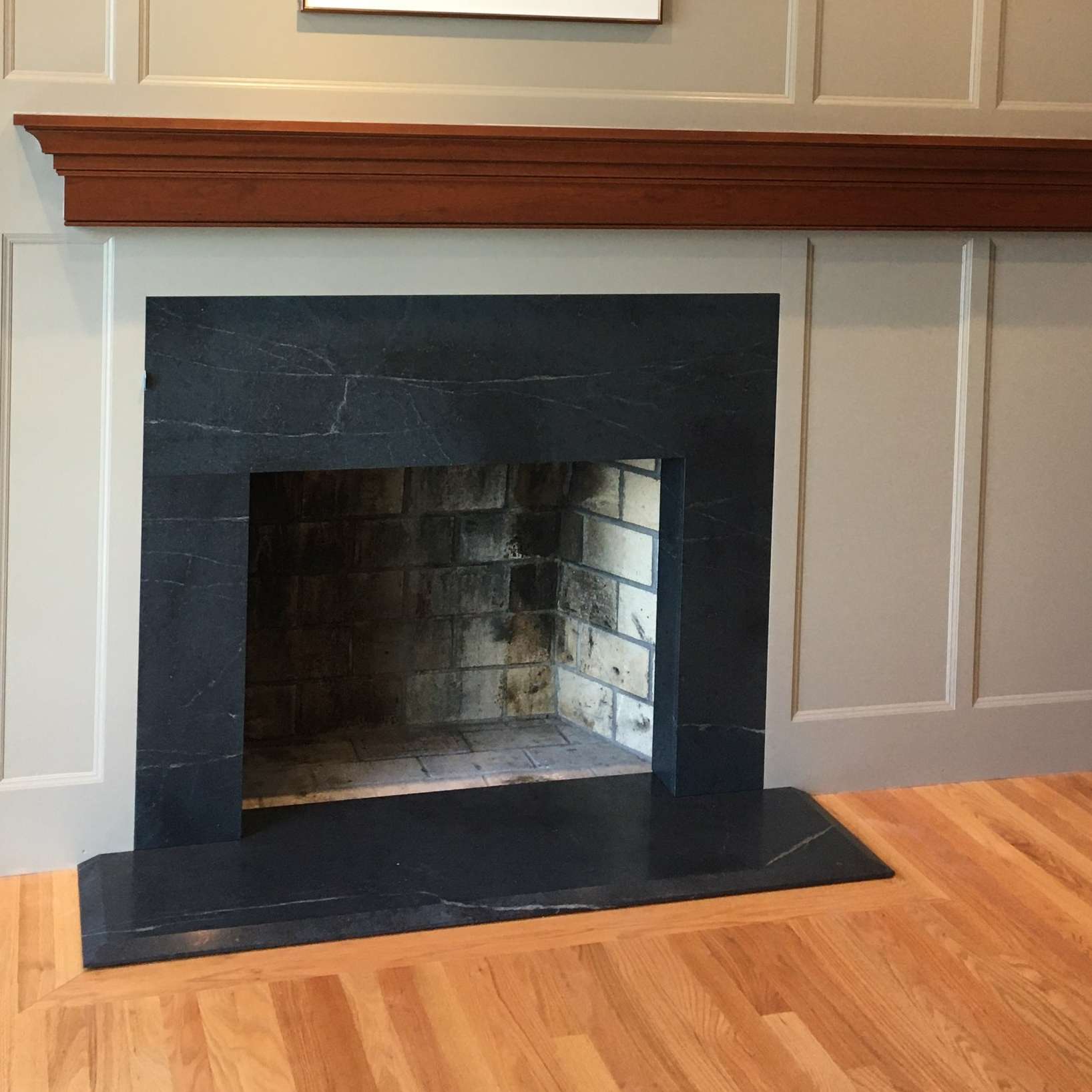 absolute black granite fireplace surround